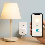 A person using a phone to turn on a table lamp plugged into a smart plug.