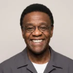 Al Green net worth 2026 - soul legend smiling on stage