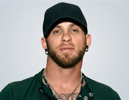 Brantley Gilbert Net Worth 2026 – Country singer performing on stage with guitar