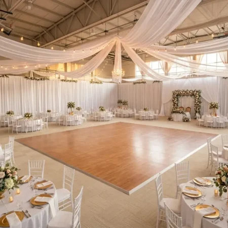 gym floor covered with portable dance floor tiles and carpet for a wedding reception