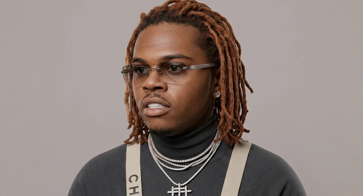 Gunna net worth 2026 — rapper standing in luxury outfit representing his financial growth