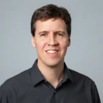 Jeff Kinney, creator of Diary of a Wimpy Kid, smiling confidently — estimated net worth of $150 million in 2026