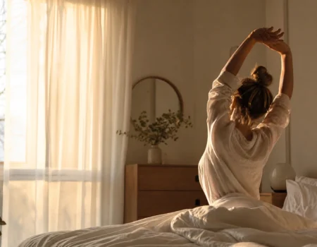 Person waking up peacefully in sunlight — tips to fix your body clock