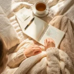Person resting peacefully in bed practicing gentle productivity chronic fatigue